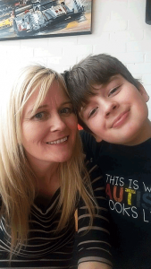 The mother of a boy with autism is fighting to stop plans for more than £20m in cuts to special needs services in Surrey